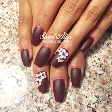 Maroon acrylic nails are trending a lot lately and the reason behind that may be obvious. Alize S Nail Artistry Matte Coffin Acrylic Nails With Acrylic Flower