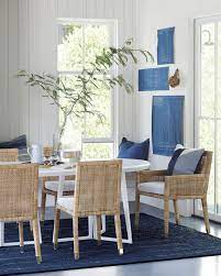 Shop for handmade rattan chairs in various colors and styles. Naturally Glamorous Our Woven Rattan Chairs Elevate This Blue And White Dining Room Oval Dining Room Table Coastal Dining Room Nautical Dining Rooms