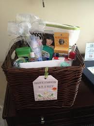 Honeymoon Basket Send The Happy Couple On Their Way With A Basket Full Of Stuff For Their Honeymoon This Baske Honeymoon Gifts Honeymoon Kit Honeymoon Basket