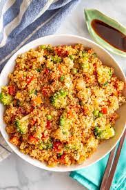 This Vegetarian Quinoa Fried Rice Is Quick And Easy To Make And Loaded With Fluffy Quinoa And Tender V Quinoa Recipes Easy Quinoa Fried Rice Vegetarian Recipes