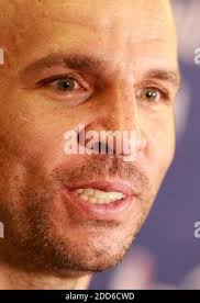 Dallas Mavericks guard Jason Kidd, front, looks to pass the ball as Denver  Nuggets rookie guard Ty Lawson defends in the fourth quarter of the  Mavericks' 104-96 victory in an NBA basketball