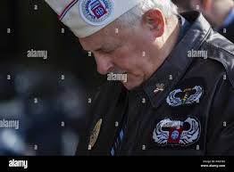 Soldier bows head hi-res stock photography and images