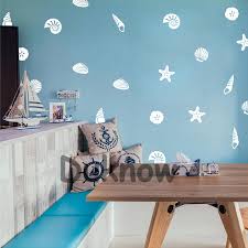 There are beautiful options that feature seashells, palm trees, fish, and more. Set Of 21 Beach Seashell Wall Decals Bathroom Wall Decor Diy Seashell Vinyl Sticker Home Nursery Coastal Mural Art Decals Wall Stickers Aliexpress