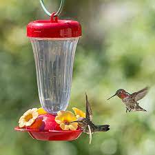 You can teach kids the importance of recycling, learning about birds punch a hole in the center of each red plastic flower and thread each one onto the end of a straw. Perky Pet Perky S Finest Yellow Flower Top Fill Plastic Hummingbird Feeder Model 136tf Perkypet Com