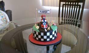 · when cassius asked for a mario kart themed birthday party (see the greatest mario party ideas here ), his parents, who are also the owners of playmaker u and mudpie. Mario Kart Cake Children S Birthday Cakes Mario Kart Cake Mario Cake Racing Cake