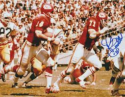 ED BUDDE KANSAS CITY CHIEFS ACTION SIGNED 8X10