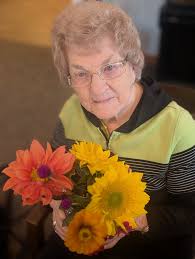 Happiness blooms from within. 🌻💐🪻 Arranging their own bouquets is such a  fun way to allow the residents to express their own individual  creativeness! Thank you again Molly for the beautiful flowers!