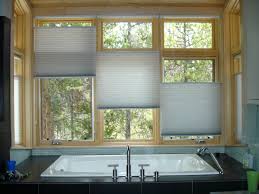 Our wide range of window blinds are custom made, provide complete light control and come with options of manual control as well as automatic control. Window Treatments By Design Interiors