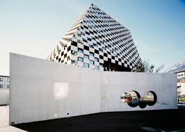 Btv Branch By Rainer Koberl A Chequerboard Of Fibre Reinforced Concrete Cloaks The Tapered Glass Walls Of This B Architecture Space Architecture Architecture