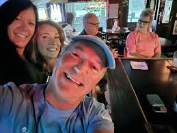 What is the name of the bar in Brooksville with great hamburgers?