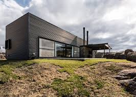 See more ideas about house, house design, house styles. Dark Corrugated Cladding Covers Mariana Palacios Self Designed Holiday Home In Argentina Cordoba Argentina