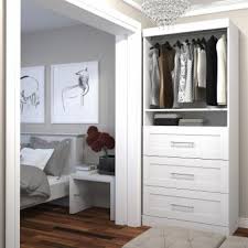 W white wood closet system with both shelf space and hanging space, with both shelf space and hanging space, the closetmaid selectives 25 in. Wood Closet Organizers Hayneedle
