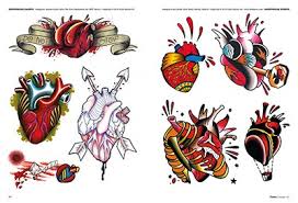 Realistic heart tattoo on chest. Sacred Anatomical Hearts