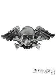 A black and grey skull missing the lower mandible is rendered on the wearer's index finger while a black depiction of a skull and crossbones is rendered on the wearer's middle finger. Yakuza Tattoo Designs Skull And Crossbones Tattoos Skull Skull And Crossbones Crossbones