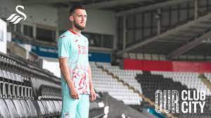 Ben davies and leon britton modelled the new swansea city home and away shirts as the club announced a record sponsorship deal. The 2020 21 Away Kit Will See Swansea City Football Club Facebook