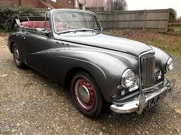 Image result for Sunbeam Silver 1990 Tracer