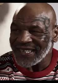 Tyson Gives Holyfield His Ear Back