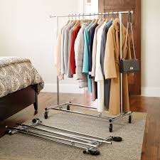Wash clothes in a washing machine on a cold setting. Clothes Rack Chrome Metal Folding Commercial Clothes Rack The Container Store