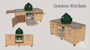 outdoor kitchen with a big green egg