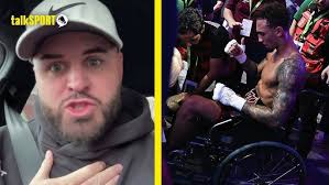 Boxrite Coach Bobby Mayne working focus mitts with Nigel Benn