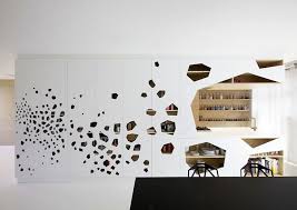 Probably a half arch so you can see through. Cut Out Geometries In Walls And Cabinets Improvised Life