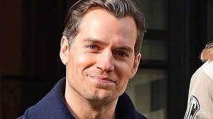 Henry Cavill makes rare appearance with his Hollywood exec girlfriend  Natalie Viscuso as the pair are spotted leaving a London hotel