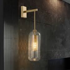1 Bulb Capsule Wall Light Sconce Modern Stylish Clear Glass Shade Indoor Wall Lighting With Gold Arm Beautifulhalo Com