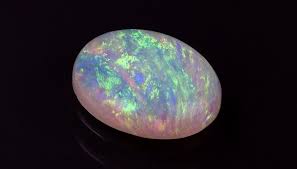 It is 2.46 carats in weight and 9.5 x 12.5 millimeters in size. October Birthstone Opal Israeli Diamond