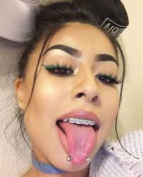 Want a piercing that matches your sneaky personality? The Snake Eyes Piercing The Most Striking Tongue Piercing