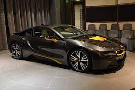 Individual Bmw I8 With Yellow Highlights Shows Up In Abu Dhabi Photo Gallery Autoevolution Best Luxury Cars Bmw I8 Luxury Cars Mercedes