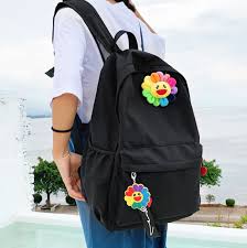 He works in fine arts media (such as painting and sculpture) as well as commercial media (such as fashion, merchandise, and animation) and is known for blurring the line between high and low arts. Murakami Flower Backpack From Ocean Kawaii Murakami Flower Murakami Aesthetic Backpack