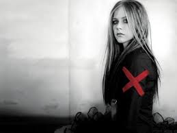 Avril lost the tie but stuck to the tomboy look in this vintage tee at z100's jingle ball. 76 Avril Lavigne Background On Wallpapersafari