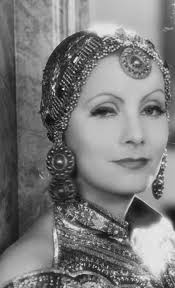 Greta Garbo as Ninotchka fights for smile! 😁