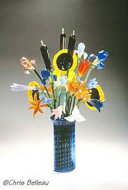 This hand blown vase is the perfect addition to your bouquet, especially if you are sending it to an office, hospital or funeral home (please note, all bouquets going to a funeral home must be accompanied by a vase). Chris Belleau Belleau Art Glass