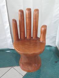 My neighbor left three large wooden spools on the curb yesterday. Wooden Carved Giant Hand Chair 41 Height Oahu Auctions