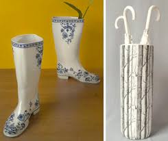 Features a circular stand of ball topped rods which can accommodate up to four pairs of wellington boots, with an umbrella tidy in the centre. Under 100 Umbrella Stands Design Sponge