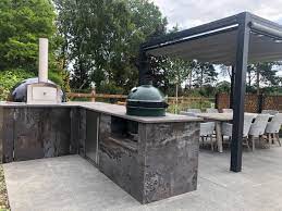 With an outdoor kitchen you can prepare meals and be around your guests with minimal time spent running back inside for plates, beverages, or tongs. How To Design And Build An Outdoor Kitchen Hollandscapes