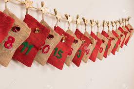 All you need are a few supplies and a bit of crochet knowledge to make the decorations for the gift bags. Closeup Of An Advent Calendar Made Of Bags Hanging On A String Stock Photo Picture And Royalty Free Image Image 91393705