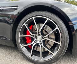 Image result for Storm Black 2013 Aston Martin