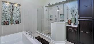 Brown wooden vanity with white sink above beside white toilet and glass shower door. 37 Fantastic Frameless Glass Shower Door Ideas Luxury Home Remodeling Sebring Design Build