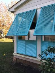 Some bahama shutters are made purely for decorative purposes, while other bahama shutters have been built for the purpose of protecting a house from storms. Exterior Shutters Richmond Bahama Roberts Awnings