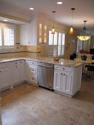 This concept kitchen uses peranakan or spanish tiles as a backsplash that also extends above the wall cabinets. Floor Option With Small Offset Tiles Love The Colors Of This Tile White Kitchen Design Beige Kitchen Modern Kitchen Flooring