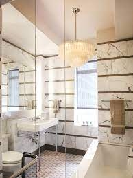 Houzz has millions of beautiful photos from the world's top designers, giving you the best design ideas for your dream remodel or simple room refresh. A 1930s Nyc Apartment Gets An Elegant New Bathroom Design Architectural Digest