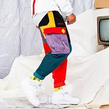 The fleece fabric provides just the right amount of warmth and is still lightweight enough for all high intensity sports and workouts. Multi Color Patched Sweatpants Just Dropped Fashion Pants Hip Hop Pants Vintage Pants