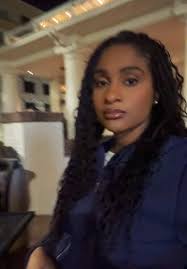 Kinigra Deon Hugging Her Daughter