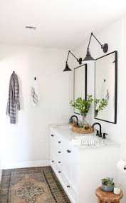 I love anchoring the design by high contrast elements that are shown here such as black hardware, faucets and windows. Modern Farmhouse Master Bathroom Renovation With Delta The Process Reveal 1111 Light Lane