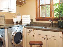 There is a bed the picture. 27 Ideas For A Fully Loaded Laundry Room This Old House