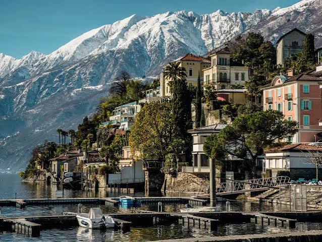 Harbor city with mountains in background