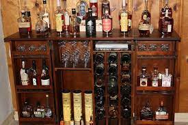 With so many types of house styles, narrowing the list down to your favorite can be overwhelming. Whiskey Cabinet Liquor Cabinet Campaign Furniture Cigars And Whiskey