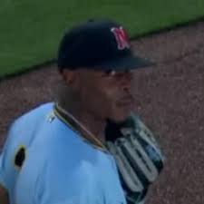 Monte Harrison makes a leaping grab at the wall